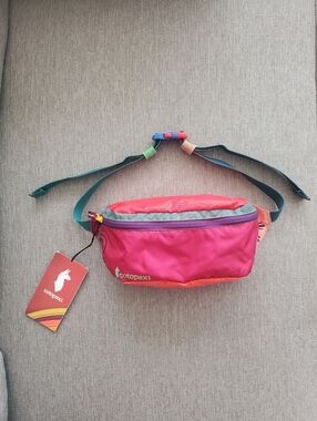 Cotopaxi Del Día colorful mutilcolor pink red orange green hip pack Fanny bag